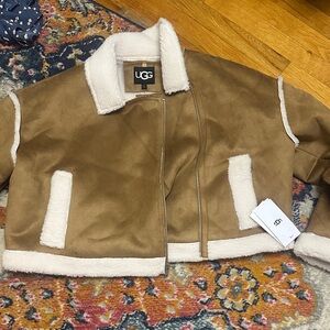 Brand new UGG faux furwomen’s Tan and Cream Coat NWT